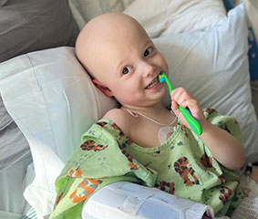 Violet, 3, a patient in Dana-Farber’s Jimmy Fund Clinic