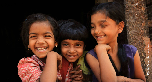Anuradha Bhosale, center, with children who participate in Avani programs.