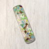 Clear epoxy resin mezuzah with reflective butterflies