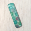 Light turquoise resin mezuzah cover with colourful flowers