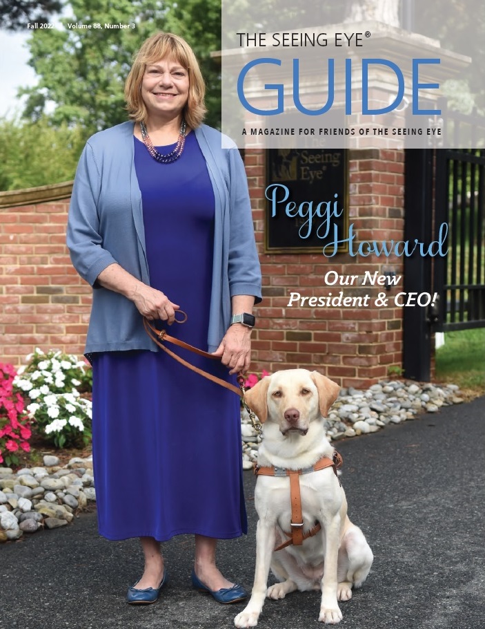 The cover of The Guide Fall 2022 shows Seeing Eye President & CEO Peggi Howard with a yellow Labrador retriever on the front driveway of The Seeing Eye. The text reads: Peggi Howard, our new President & CEO!
