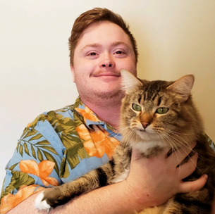 Ruadhan Ward and their rescue cat, HobNob.png